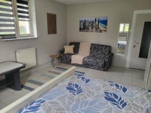 Ένα ή περισσότερα κρεβάτια σε δωμάτιο στο Panorama Widok