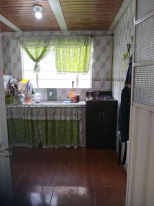 Η κουζίνα ή μικρή κουζίνα στο Habitación a muy buen precio 2x1 +14 φωτογραφίες