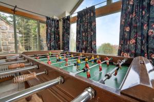 a game room with a table and a chessboard at Finest Retreats - Rough Close Farm Cottage in Ashover
