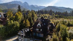 an aerial view of a house in the mountains at Delta House in Zakopane