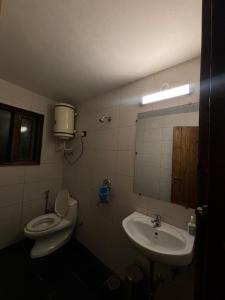 Koupelna v ubytování Green Ville by Stay Stories + 14 fotografií