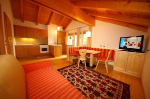 TV a/nebo společenská místnost v ubytování Hotel La Müda