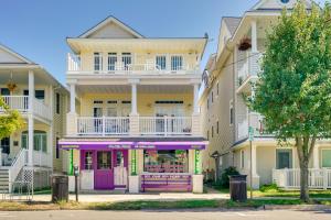a building with a purple storefront in front of it at Ocean City Family Getaway about Qtr-Mi to Beach! in Ocean City