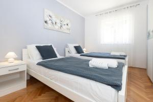 Ένα ή περισσότερα κρεβάτια σε δωμάτιο στο House Marija 2036 +28 φωτογραφίες
