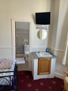 TV a/nebo společenská místnost v ubytování Coastal Place