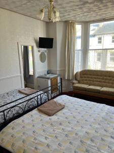 Postel nebo postele na pokoji v ubytování Coastal Place