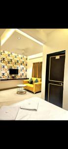 Posezení v ubytování Lotus - कमल Excutive Maharashtra