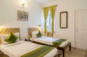 Postel nebo postele na pokoji v ubytování Mayfair Hotel