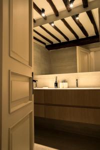 a bathroom with a sink and a mirror at Casa Allegra in Pietrasanta +47 photos