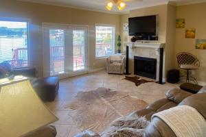 a living room with a couch and a fireplace at Central Terrace Retreat in Hot Springs