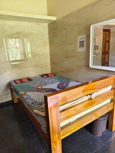 Postel nebo postele na pokoji v ubytování Coastal Plains Gokarna Homestay