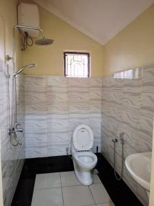 Koupelna v ubytování Moshi Comfort Stay + 14 fotografií