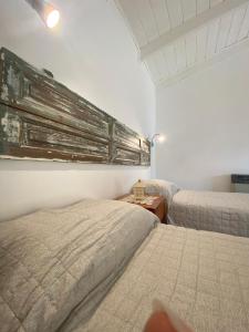 Ένα ή περισσότερα κρεβάτια σε δωμάτιο στο Inti Laufquen