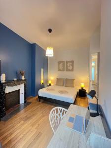 Postel nebo postele na pokoji v ubytování Bienvenu en Anjou + 13 fotografií