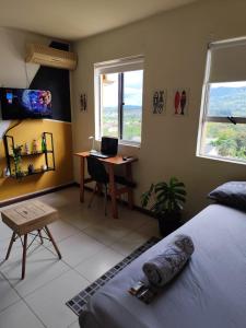 Μια τηλεόραση ή/και κέντρο ψυχαγωγίας στο Quarto no Rosário "Apto compartilhado"