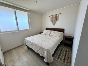 Postel nebo postele na pokoji v ubytování Apartamento primera linea El Tabo