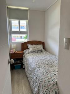 Postel nebo postele na pokoji v ubytování Apartamento primera linea El Tabo