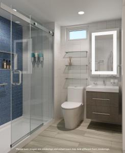 un bagno con wc, lavandino e doccia di Divi Little Bay Beach Resort a Philipsburg
