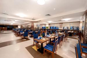 Εστιατόριο ή άλλο μέρος για φαγητό στο Grand Plaza Badr Al Maqam Fully Renovated