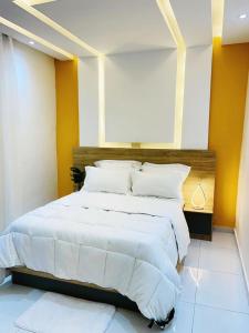 Postel nebo postele na pokoji v ubytování APPART'HORIZOn + 2 fotografie