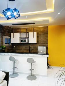 Kuchyň nebo kuchyňský kout v ubytování APPART'HORIZOn