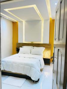 Postel nebo postele na pokoji v ubytování APPART'HORIZOn