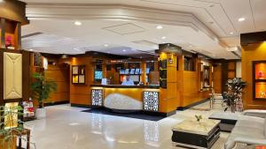 a lobby with a bar in a hotel at رفا للشقق المخدومة-اقتصادي in Riyadh