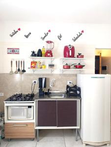 Kuchyň nebo kuchyňský kout v ubytování Apartamento próx ao centro com vaga
