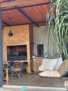 a living room with a couch and a table at Terra Bella in Fernando de la Mora