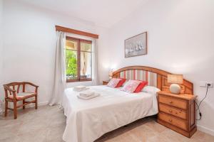 Postel nebo postele na pokoji v ubytování Casa Faro