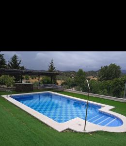 Bazén v ubytování villadolore nebo v jeho okolí