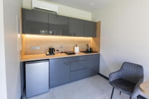 Η κουζίνα ή μικρή κουζίνα στο ERNESTÓWKA - Hotel