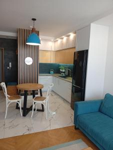 Кухня или мини-кухня в Szymborskiej 2 Centrum z parkingiem podziemnym Apartamenty LUNA Bialystok
