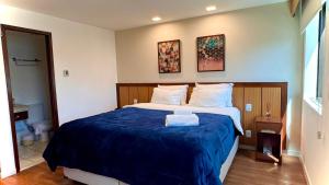 Ένα ή περισσότερα κρεβάτια σε δωμάτιο στο M N Flats Hotel Av Ibirapuera 2927