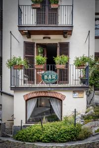 a building with a sign that says say spa on it at B&B Locanda Del Mulino in Pamparato