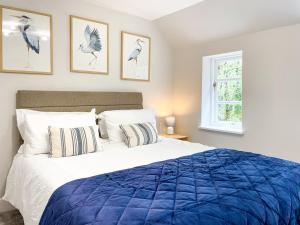 Voodi või voodid majutusasutuse 2 Woodbine Cottage toas