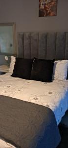 Postel nebo postele na pokoji v ubytování At30 OverNite Stay + 5 fotografií