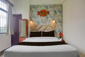 Katil atau katil-katil dalam bilik di Townhouse OAK Hotel Dream Palace +28 gambar