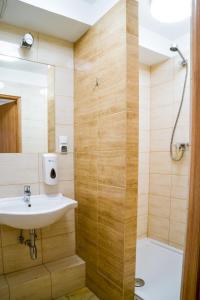 Kúpeľňa v ubytovaní ZGODA Kompleks Hotelarski