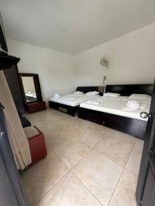 Ένα ή περισσότερα κρεβάτια σε δωμάτιο στο Villa Sandra +6 φωτογραφίες