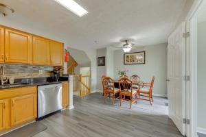 a kitchen and dining room with a table and chairs at Close to Hospital and White Marsh! Rosedale Townhome in Nottingham