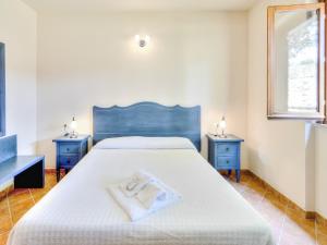 Ένα ή περισσότερα κρεβάτια σε δωμάτιο στο Gorgeous Holiday Home in Sorano with Swimming Pool