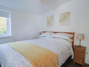 Ένα ή περισσότερα κρεβάτια σε δωμάτιο στο The Roost