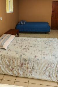 En eller flere senge i et værelse på Villa Vallarta Costa del Sol