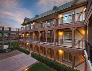 an exterior view of a building with balconies at WorldMark Solvang in Solvang