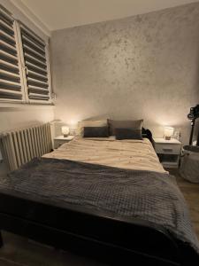 Postel nebo postele na pokoji v ubytování Nina Urban Apartment-Novi Beograd