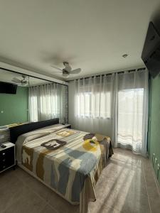 Voodi või voodid majutusasutuse Adosado cerca de la playa y montaña, relax toas +20 fotot