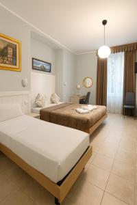 Katil atau katil-katil dalam bilik di Hotel Aurelia Milano Centrale