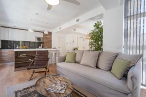 a living room with a couch and a table at ChezmoiHomes Plaza Nueva in Granada +145 photos