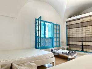 a bedroom with two beds and a window at Peaceful Haven, Villa Private Rooms, Absolute Quiet in Bin Rhilouf +17 photos